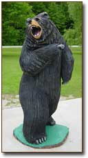 Bear Standing - Chainsaw Sculpture by James W. Denkins